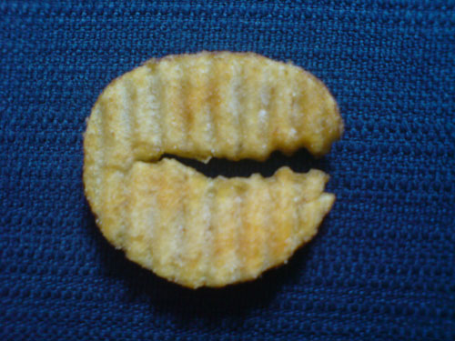 The Pac-Man crisp has returned to save us from our crisp-stuffing